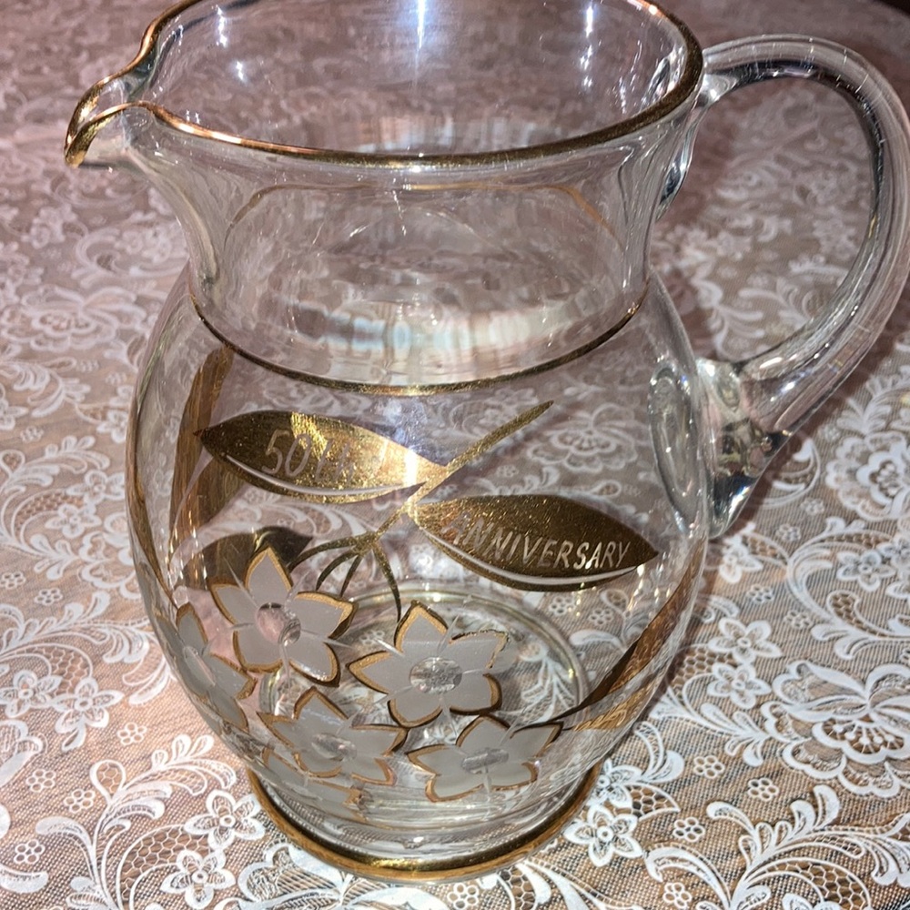 Golden Anniv (50) glass pitcher, 8” hi x 5”+2” handle, intact gold dec.    $15